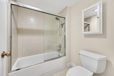 Welcome to this light and bright 2BR/2.5BA lakefront townhouse on Boca Lago Golf and Country Club in Florida - for sale on GolfHomes.com, golf home, golf lot