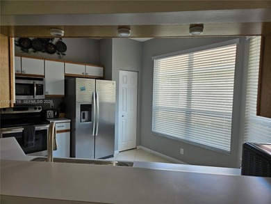 Lovely 3BR/2BA/2CG villa in the gated community of Summerfield on Champions Club at Summerfield in Florida - for sale on GolfHomes.com, golf home, golf lot