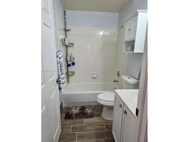 Lovely 3BR/2BA/2CG villa in the gated community of Summerfield on Champions Club at Summerfield in Florida - for sale on GolfHomes.com, golf home, golf lot