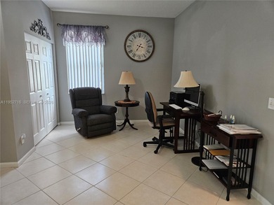 Lovely 3BR/2BA/2CG villa in the gated community of Summerfield on Champions Club at Summerfield in Florida - for sale on GolfHomes.com, golf home, golf lot