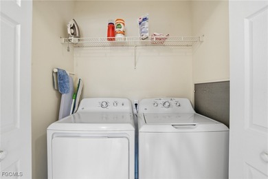 Begin your day with coffee on the newly screened lanai on Colonial Country Club in Florida - for sale on GolfHomes.com, golf home, golf lot