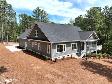 Stunning New Golf Front Home in Seven Lakes West. Welcome to on Beacon Ridge Golf and Country Club in North Carolina - for sale on GolfHomes.com, golf home, golf lot