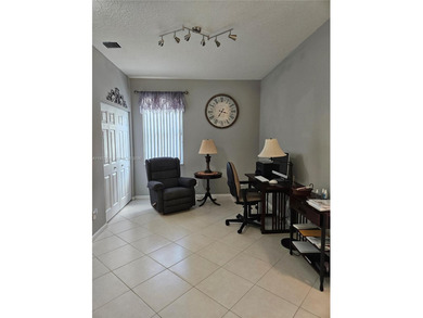 Lovely 3BR/2BA/2CG villa in the gated community of Summerfield on Champions Club at Summerfield in Florida - for sale on GolfHomes.com, golf home, golf lot