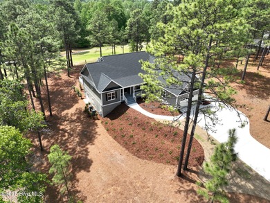 Stunning New Golf Front Home in Seven Lakes West. Welcome to on Beacon Ridge Golf and Country Club in North Carolina - for sale on GolfHomes.com, golf home, golf lot