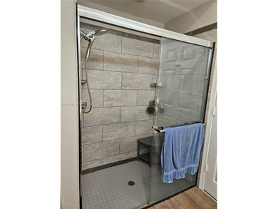 Lovely 3BR/2BA/2CG villa in the gated community of Summerfield on Champions Club at Summerfield in Florida - for sale on GolfHomes.com, golf home, golf lot