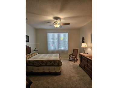 Lovely 3BR/2BA/2CG villa in the gated community of Summerfield on Champions Club at Summerfield in Florida - for sale on GolfHomes.com, golf home, golf lot