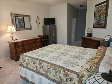 Lovely 3BR/2BA/2CG villa in the gated community of Summerfield on Champions Club at Summerfield in Florida - for sale on GolfHomes.com, golf home, golf lot