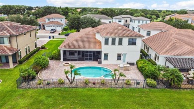 This stunning five-bedroom, four-bathroom pool home is located on Eagle Creek Golf Club in Florida - for sale on GolfHomes.com, golf home, golf lot