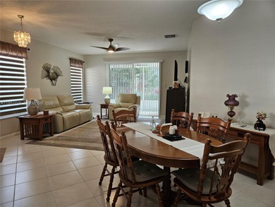 Lovely 3BR/2BA/2CG villa in the gated community of Summerfield on Champions Club at Summerfield in Florida - for sale on GolfHomes.com, golf home, golf lot