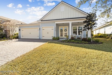 Live where every day feels like a getaway in this beautifully on Amelia National Golf and Country Club in Florida - for sale on GolfHomes.com, golf home, golf lot