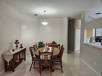 Lovely 3BR/2BA/2CG villa in the gated community of Summerfield on Champions Club at Summerfield in Florida - for sale on GolfHomes.com, golf home, golf lot