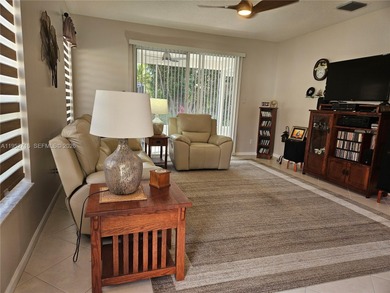 Lovely 3BR/2BA/2CG villa in the gated community of Summerfield on Champions Club at Summerfield in Florida - for sale on GolfHomes.com, golf home, golf lot