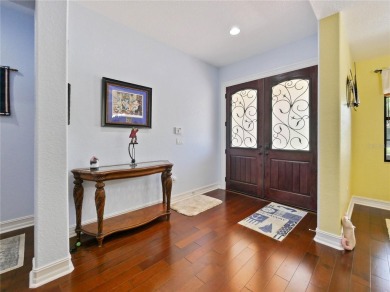 This stunning five-bedroom, four-bathroom pool home is located on Eagle Creek Golf Club in Florida - for sale on GolfHomes.com, golf home, golf lot