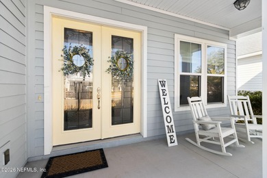 Live where every day feels like a getaway in this beautifully on Amelia National Golf and Country Club in Florida - for sale on GolfHomes.com, golf home, golf lot