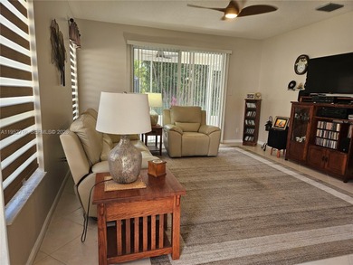 Lovely 3BR/2BA/2CG villa in the gated community of Summerfield on Champions Club at Summerfield in Florida - for sale on GolfHomes.com, golf home, golf lot