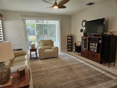 Lovely 3BR/2BA/2CG villa in the gated community of Summerfield on Champions Club at Summerfield in Florida - for sale on GolfHomes.com, golf home, golf lot