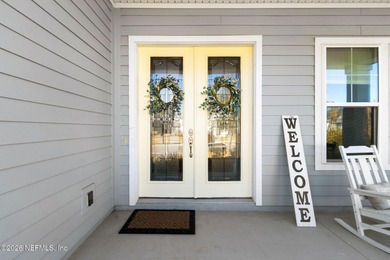 Live where every day feels like a getaway in this beautifully on Amelia National Golf and Country Club in Florida - for sale on GolfHomes.com, golf home, golf lot