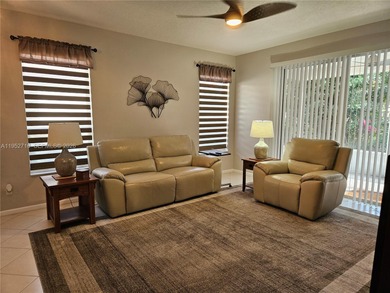 Lovely 3BR/2BA/2CG villa in the gated community of Summerfield on Champions Club at Summerfield in Florida - for sale on GolfHomes.com, golf home, golf lot