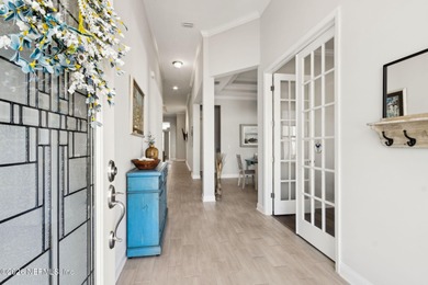 Live where every day feels like a getaway in this beautifully on Amelia National Golf and Country Club in Florida - for sale on GolfHomes.com, golf home, golf lot