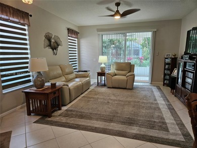 Lovely 3BR/2BA/2CG villa in the gated community of Summerfield on Champions Club at Summerfield in Florida - for sale on GolfHomes.com, golf home, golf lot