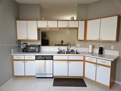 Lovely 3BR/2BA/2CG villa in the gated community of Summerfield on Champions Club at Summerfield in Florida - for sale on GolfHomes.com, golf home, golf lot