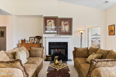 Discover the epitome of luxury living in this stunning end-unit on Lennon Hills Golf Course in North Carolina - for sale on GolfHomes.com, golf home, golf lot