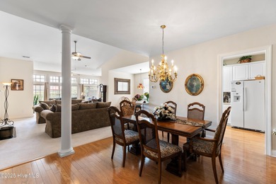 Discover the epitome of luxury living in this stunning end-unit on Lennon Hills Golf Course in North Carolina - for sale on GolfHomes.com, golf home, golf lot