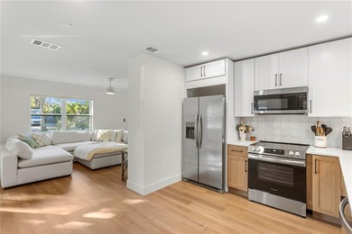 This fully remodeled 2 bedroom, 1.5 bathroom single story home on The Dunedin Country Club in Florida - for sale on GolfHomes.com, golf home, golf lot