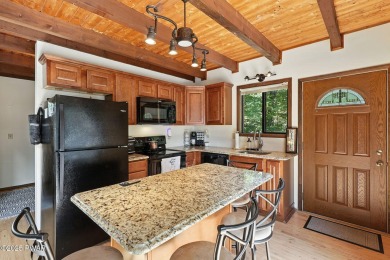 This beautifully maintained 3-bedroom, 2-bath chalet is tucked on The Hideout Golf in Pennsylvania - for sale on GolfHomes.com, golf home, golf lot