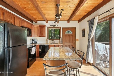 This beautifully maintained 3-bedroom, 2-bath chalet is tucked on The Hideout Golf in Pennsylvania - for sale on GolfHomes.com, golf home, golf lot