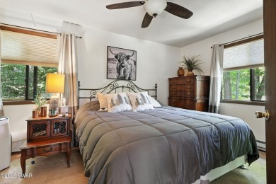 This beautifully maintained 3-bedroom, 2-bath chalet is tucked on The Hideout Golf in Pennsylvania - for sale on GolfHomes.com, golf home, golf lot