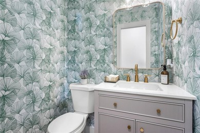 This fully remodeled 2 bedroom, 1.5 bathroom single story home on The Dunedin Country Club in Florida - for sale on GolfHomes.com, golf home, golf lot