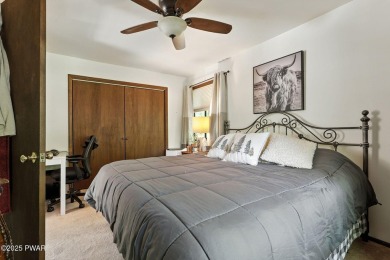This beautifully maintained 3-bedroom, 2-bath chalet is tucked on The Hideout Golf in Pennsylvania - for sale on GolfHomes.com, golf home, golf lot