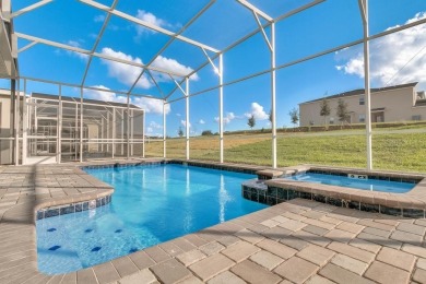 This stunning vacation home features 8 bedrooms, 5 bathrooms on ChampionsGate Golf Resort in Florida - for sale on GolfHomes.com, golf home, golf lot