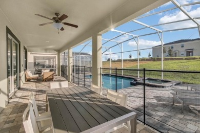 This stunning vacation home features 8 bedrooms, 5 bathrooms on ChampionsGate Golf Resort in Florida - for sale on GolfHomes.com, golf home, golf lot