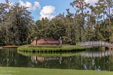 Located in the prestigious Community of Eagle Harbor in Fleming on Eagle Harbor Golf Club in Florida - for sale on GolfHomes.com, golf home, golf lot
