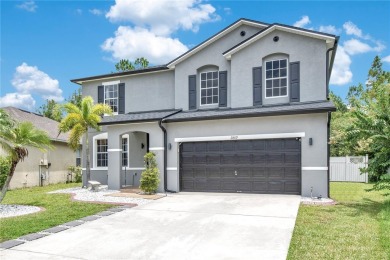 This beautifully updated 5-bedroom, 3-bath home is located in a on Wedgefield Golf Club in Florida - for sale on GolfHomes.com, golf home, golf lot