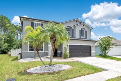 This beautifully updated 5-bedroom, 3-bath home is located in a on Wedgefield Golf Club in Florida - for sale on GolfHomes.com, golf home, golf lot