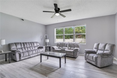 This beautifully updated 5-bedroom, 3-bath home is located in a on Wedgefield Golf Club in Florida - for sale on GolfHomes.com, golf home, golf lot
