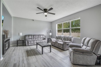 This beautifully updated 5-bedroom, 3-bath home is located in a on Wedgefield Golf Club in Florida - for sale on GolfHomes.com, golf home, golf lot