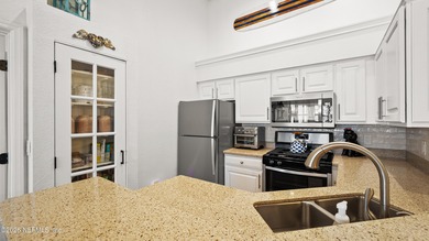 Elevated living awaits in this rare third-floor 2-bedroom on Windsor Parke Golf Club in Florida - for sale on GolfHomes.com, golf home, golf lot