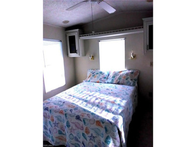 Land Included with home. Great value on this furnished Park on The Rookery At Marco in Florida - for sale on GolfHomes.com, golf home, golf lot