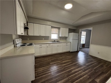 Great potential rental units. Front unit 1 is a 3-bedroom, 1 on Lozano Public Golf Center  in Texas - for sale on GolfHomes.com, golf home, golf lot
