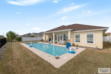 Discover this beautiful 3-bedroom, 2-bathroom lakeside home in on South Padre Island Golf Club in Texas - for sale on GolfHomes.com, golf home, golf lot