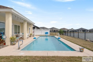 Discover this beautiful 3-bedroom, 2-bathroom lakeside home in on South Padre Island Golf Club in Texas - for sale on GolfHomes.com, golf home, golf lot