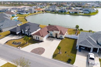 Discover this beautiful 3-bedroom, 2-bathroom lakeside home in on South Padre Island Golf Club in Texas - for sale on GolfHomes.com, golf home, golf lot