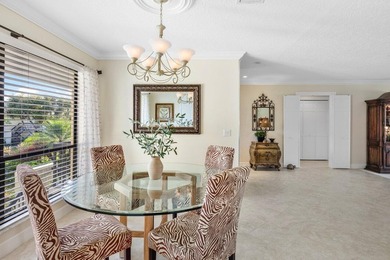 Enjoy gorgeous golf course and lake views from this stunning on Quail Ridge Golf Course and Country Club in Florida - for sale on GolfHomes.com, golf home, golf lot