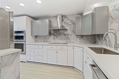 Experience affordable luxury in this beautifully renovated on Wynmoor Golf Course in Florida - for sale on GolfHomes.com, golf home, golf lot