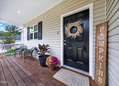 This better than new custom built 2021 home offers an open floor on River Golf and Country Club at Lake Royale in North Carolina - for sale on GolfHomes.com, golf home, golf lot