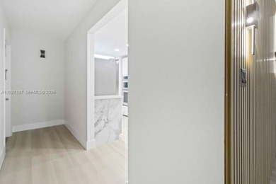 Experience affordable luxury in this beautifully renovated on Wynmoor Golf Course in Florida - for sale on GolfHomes.com, golf home, golf lot